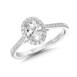 Diamond halo engagement ring mounting in 14k white gold.