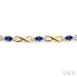 4x3 MM Oval Cut Sapphire and 1/10 Ctw Single Cut Diamond Bracelet in 14K Yellow Gold