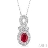 6x4 MM Oval Cut Ruby and 1/5 Ctw Round Cut Diamond Pendant in 14K White Gold with Chain