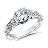 Diamond engagement ring mounting with milgrain detailing and side stones set in 14k white gold.