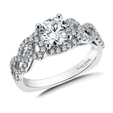 Diamond engagement ring mounting with side stones set in 14k white gold.