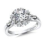 Diamond halo engagement ring mounting with baguette side stones set in 14k white gold.