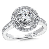 Diamond halo engagement ring mounting with side stones set in 14k white gold.