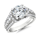 Diamond engagement ring mounting with side stones in 14k white gold.