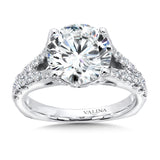 Diamond split shank support the round center stone accented with delicate 14k white gold detailing and secret diamond.