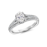 Oval center engagement ring with a diamond accented split shoulder in 14k white gold.