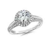 A diamond halo mount set in 14k white gold.