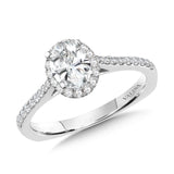 Diamond halo engagement ring mounting in 14k white gold.