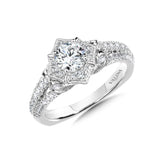 Diamond halo engagement ring mounting in 14k white gold.