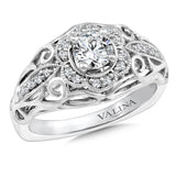 Diamond engagement ring mounting with milgrain detailing and side stones set in 14k white gold.