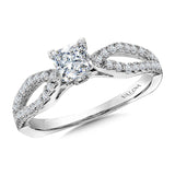 Diamond split shank engagement ring mounting set in 14k white gold.