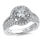 Diamond halo engagement ring mounting with side stones set in 14k white gold.