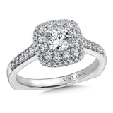 Diamond halo engagement ring mounting with side stones set in 14k white gold.