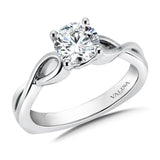 Solitaire engagement ring mounting set in 14k white gold.