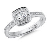 Diamond halo engagement ring mounting with side stones set in 14k white gold.