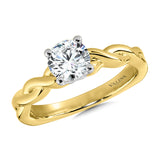 Polished twist engagement ring in 14k Yellow gold, including two hidden accent diamonds under the center stone.