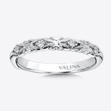 Diamond accented 14k white gold wedding ring with milgrain detailing and unique design.