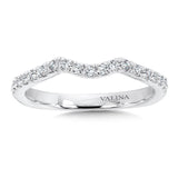 Diamond and 14k white gold wedding ring that curves to pair with matching crisscross engagement ring.