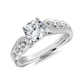 Diamond engagement ring mounting with side stones set in 14k white gold.