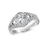 Diamond engagement ring mounting with tapered baguettes and round side stones set in 14k white gold.