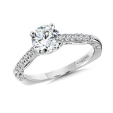 Diamond engagement ring mounting with an elegant ribbon-like profile detailing and side stones set in 14k white gold.