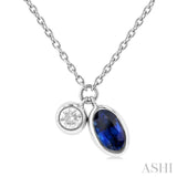 1/50 ctw Oval Cut 5X3MM sapphire and Bezel Set Round Cut Diamond Precious Necklace in 10K White Gold