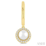 1/8 Ctw Petite 5.5 MM Cultured Pearl and Round Cut Diamond Halo Fashion Huggies in 10K Yellow Gold