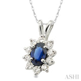 6x4MM Oval Cut Sapphire and 1/4 Ctw Round Cut Diamond Pendant in 14K White Gold with Chain