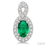 5x3 MM Oval Cut Emerald and 1/5 Ctw Round Cut Diamond Earrings in 14K White Gold