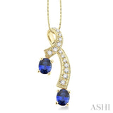 5x4MM Oval Cut Sapphire and 1/6 Ctw Round Cut Diamond Precious Pendant in 14K Yellow Gold with Chain