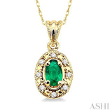 5x3mm Oval Shape Emerald and 1/20 Ctw Single Cut Diamond Pendant in 14K Yellow Gold with Chain