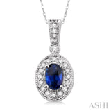 6x4 MM Oval Cut Sapphire and 1/8 Ctw Round Cut Diamond Pendant in 14K White Gold with Chain