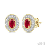 5x3 MM Oval Cut Ruby and 1/4 Ctw Round Cut Diamond Earrings in 14K Yellow Gold