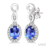5x3 MM Oval Cut Tanzanite and 1/6 Ctw Round Cut Diamond Earrings in 10K White Gold