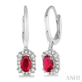 5x3 MM Oval Cut Ruby and 1/6 Ctw Round Cut Diamond Earrings in 14K White Gold