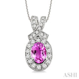 7x5mm Oval Cut Pink Sapphire and 5/8 Ctw Round Cut Diamond Pendant in 14K White Gold with chain