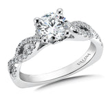 Diamond engagement ring mounting with crisscross shoulders and side stones set in 14k white gold.