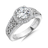 Diamond halo engagement ring mounting with milgrain detailing and side stones set in 14k white gold.
