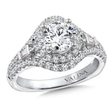 Diamond engagement ring mounting with tapered baguettes and round side stones set in 14k white gold.