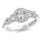 Diamond halo engagement ring mounting with side stones set in 14k white gold.
