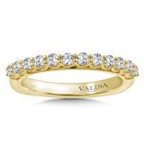 Diamond stackable wedding band with intricate milgrain detailing in 14k yellow gold.