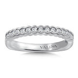 Diamond stackable wedding band with intricate milgrain detailing in 14k white gold.