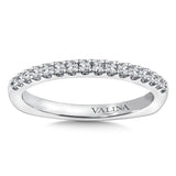 Diamond stackable wedding band in 14k white gold.
