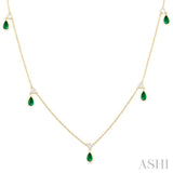 1/4 ctw Round Cut Diamonds and 5X3MM Pear Shape Emerald Precious Station Necklace in 10K Yellow Gold