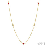 1/6 ctw Round Cut Diamond and 1.75MM Ruby Precious Station Necklace in 14K Yellow Gold