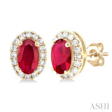1/8 ctw Round Cut Diamond and 5X3MM Oval Shape Ruby Halo Precious Stud Earrings in 10K Yellow Gold